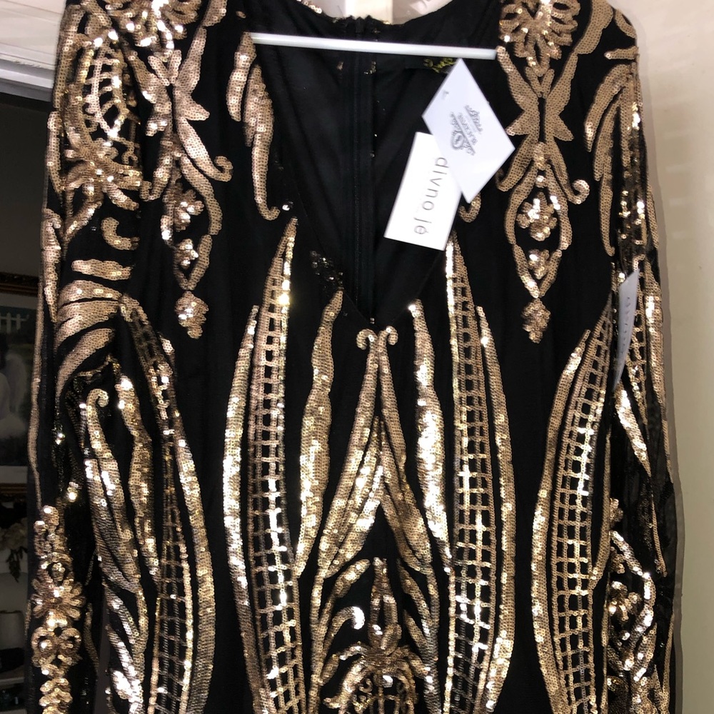 Black and gold sequin dress